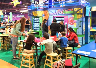 children playing and coloring at the crayola experience